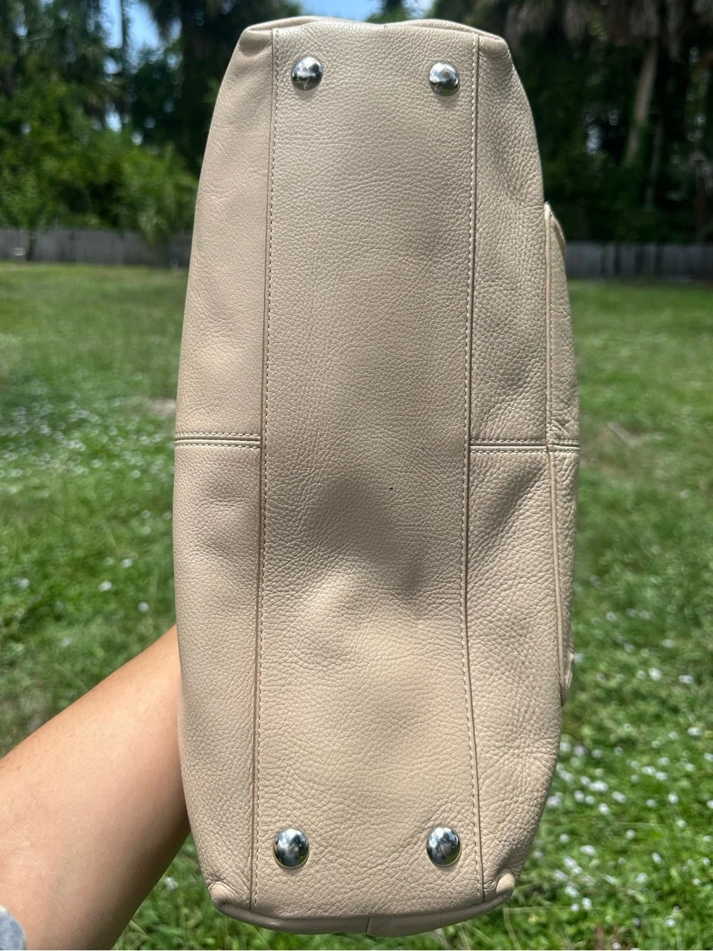 Coach Penelope pebbled leather purse in tan and cream w/ turn lock front pocket